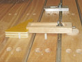 slatted table top showing reference holes for pins